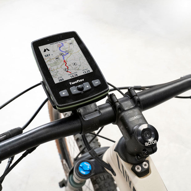 A black bike handlebar mount designed for GPS devices, featuring a double ball system for rotation and tilt adjustment.
